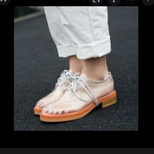 Clear see through Oxford wing tip shoes